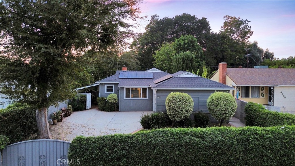 6649 Ranchito Avenue Van Nuys, CA 91405 - Photo 4 of 31 a front view of a house with a garden