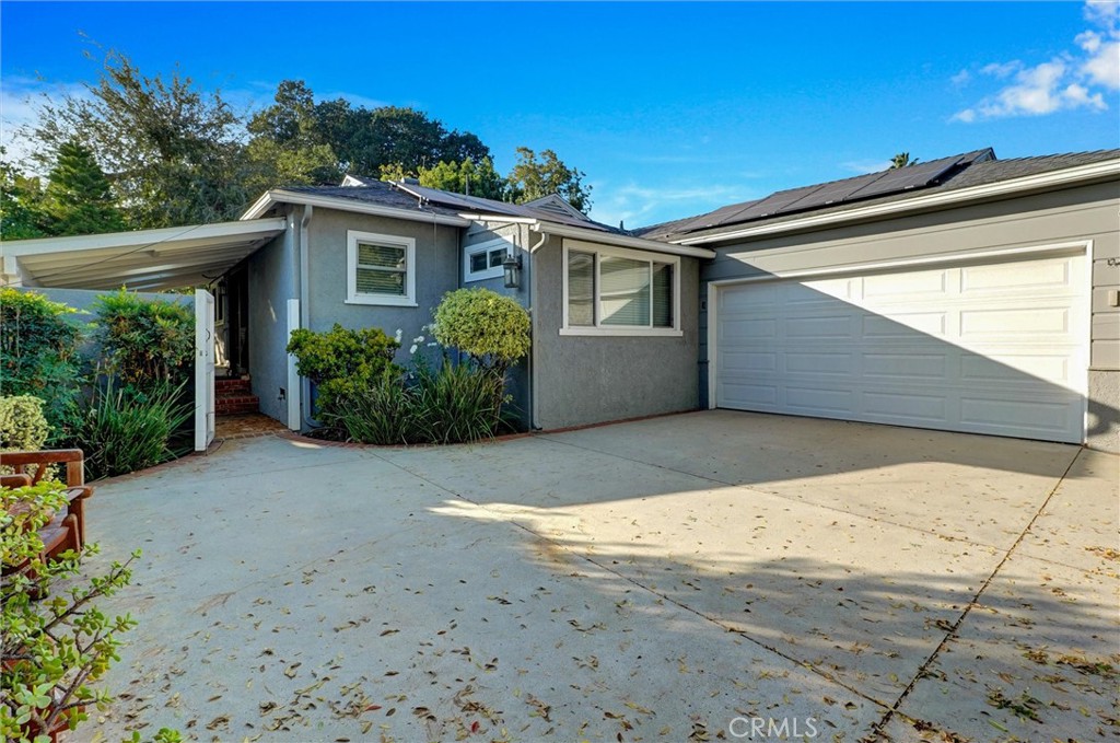 6649 Ranchito Avenue Van Nuys, CA 91405 - Photo 6 of 31 a view of backyard with potted plants