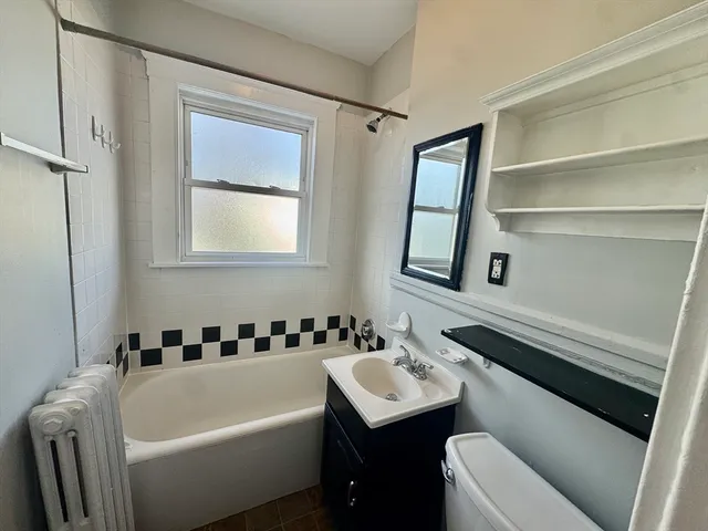 a bathroom with a sink and a bathtub