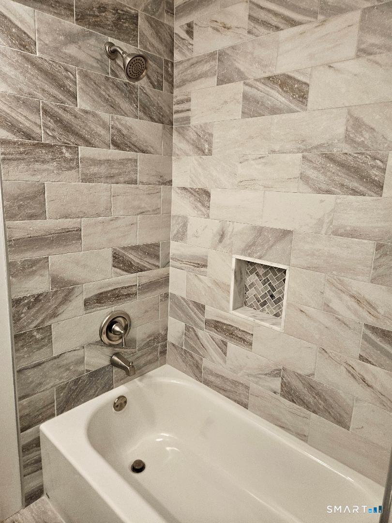 300 Railtree Hill Road Woodbury, CT 06798 - Photo 7 of 7 a bathroom with a bathtub
