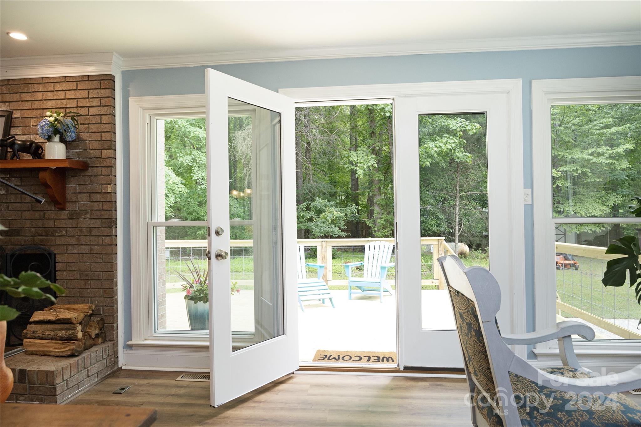 819 Homestead Road Chapel Hill, NC 27516 - Photo 27 of 42 a view of a dining room with furniture window and outside view