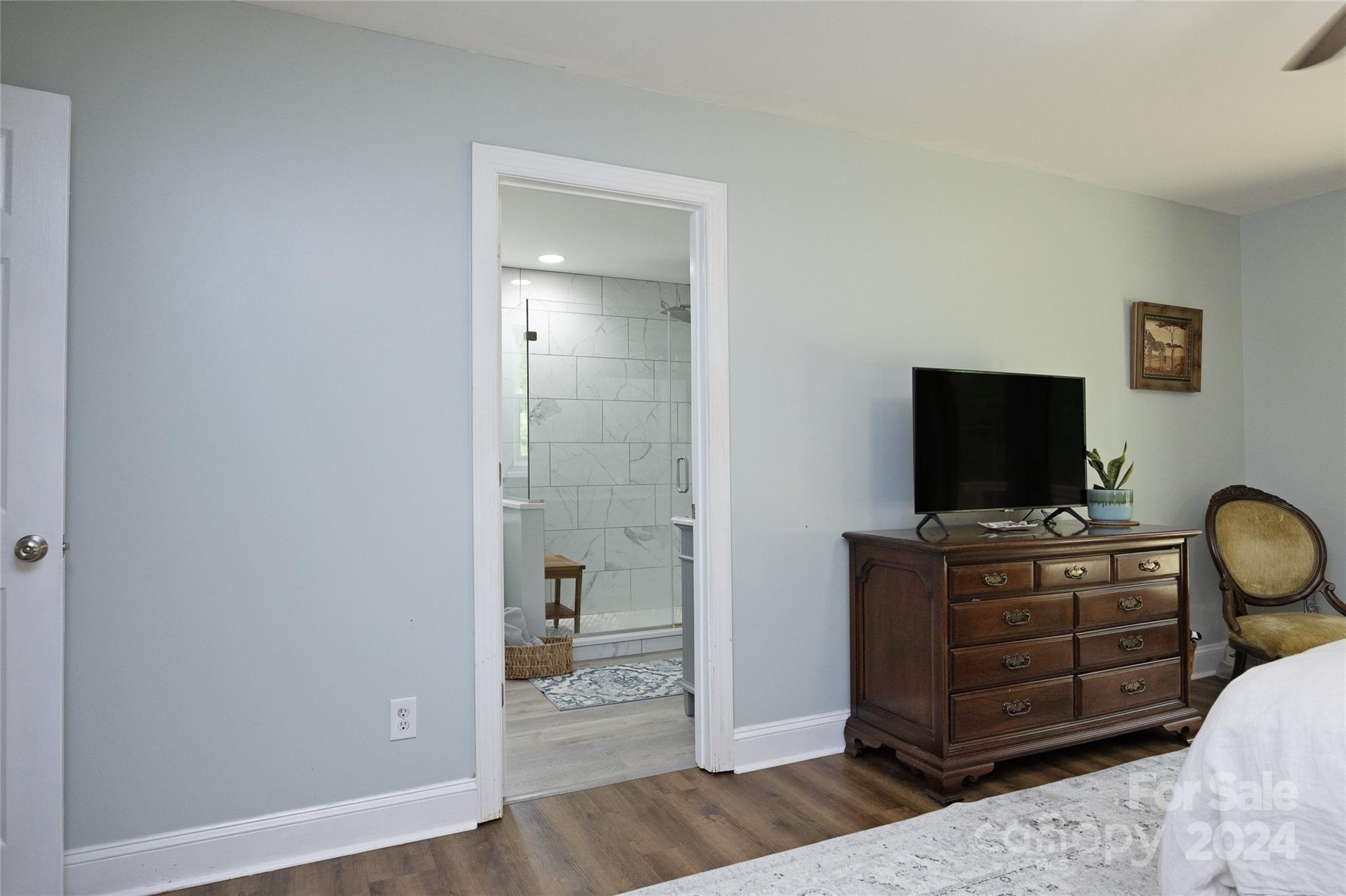 819 Homestead Road Chapel Hill, NC 27516 - Photo 30 of 42 a living room with furniture and flat screen tv