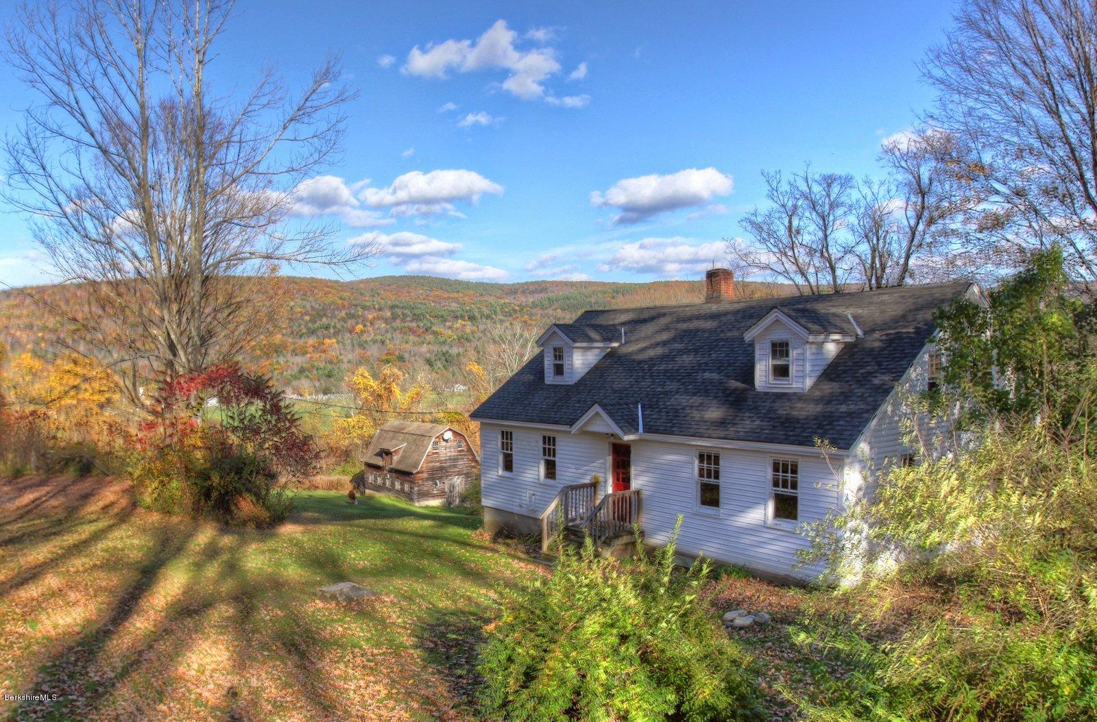 25 Jerusalem Road Tyringham, MA 01264 - Photo 1 of 30 a view of a house with a yard