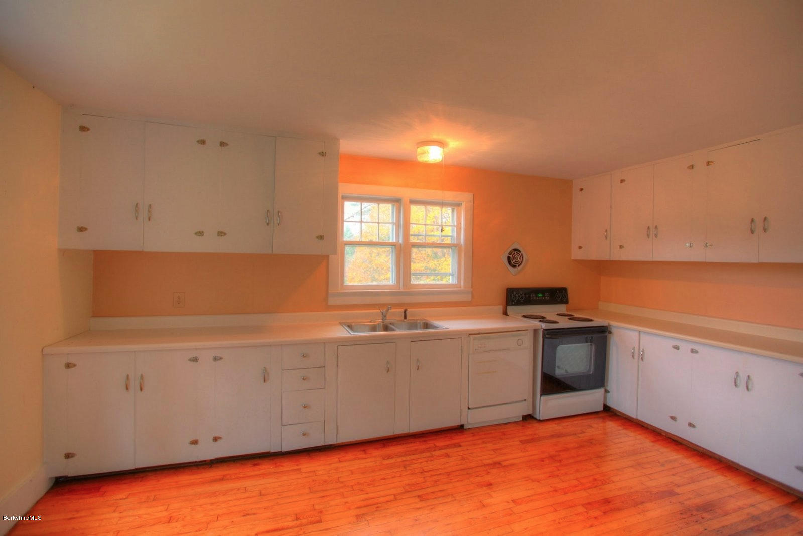 25 Jerusalem Road Tyringham, MA 01264 - Photo 11 of 30 a kitchen with granite countertop a sink and cabinets