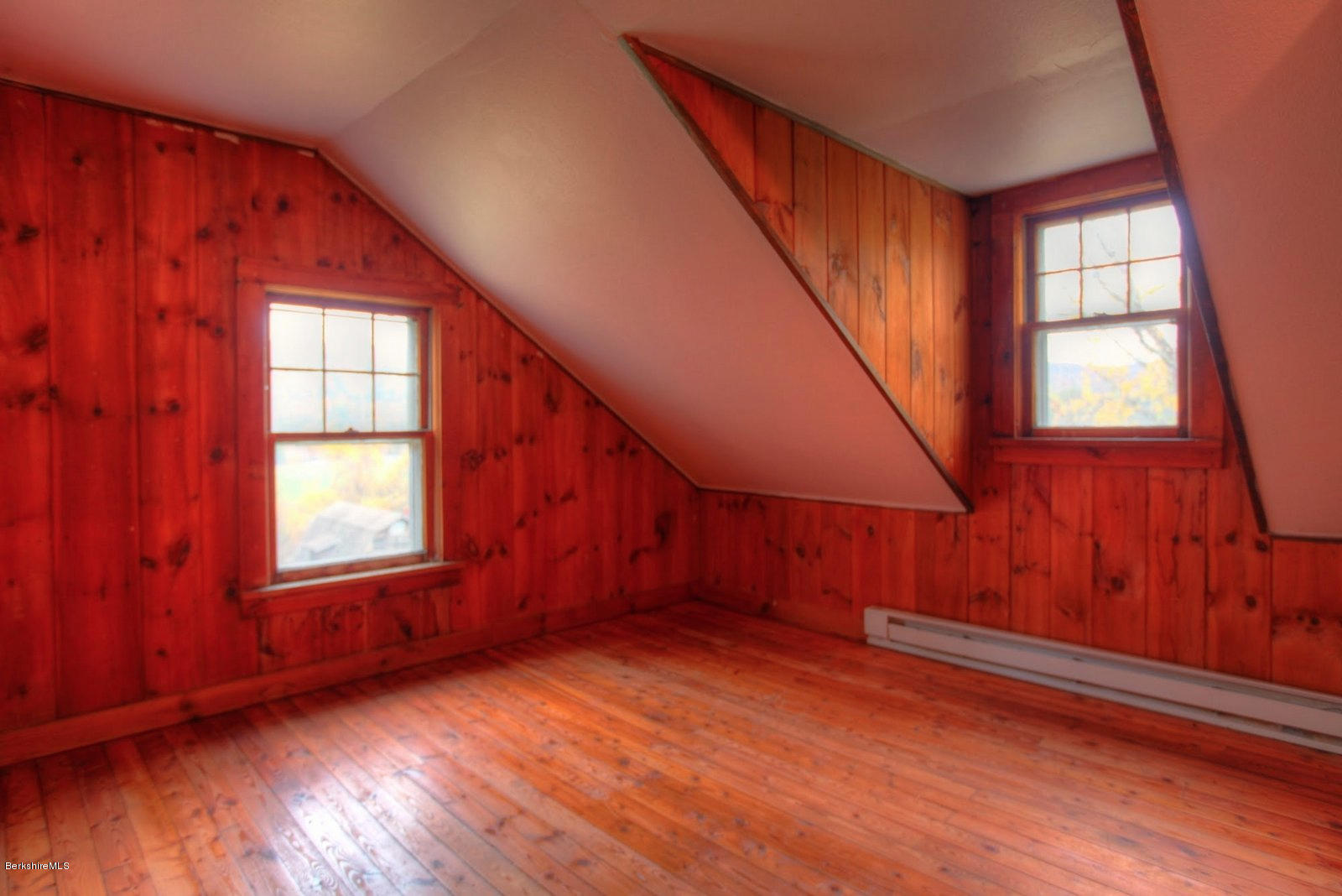 25 Jerusalem Road Tyringham, MA 01264 - Photo 18 of 30 an empty room with wooden floor and windows