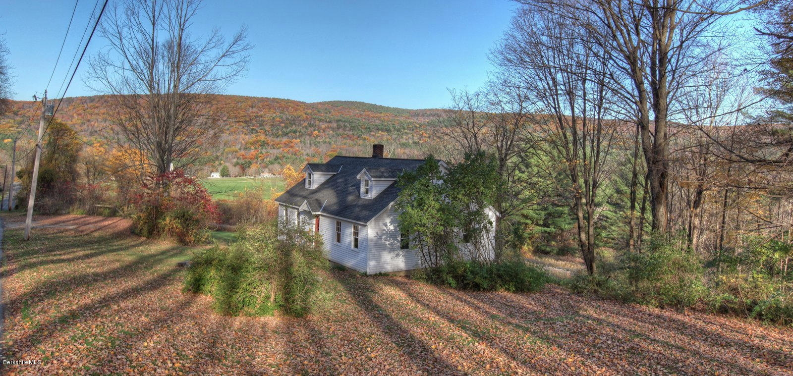 25 Jerusalem Road Tyringham, MA 01264 - Photo 28 of 30 a view of a yard with mountain and wooden fence