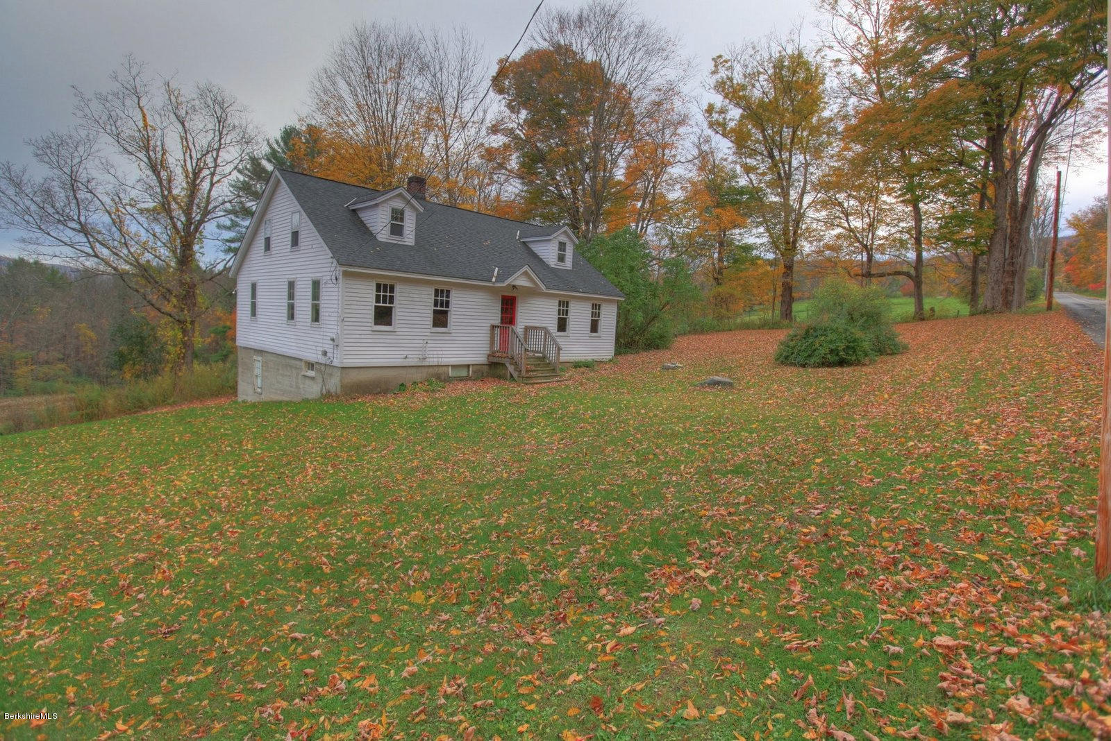 25 Jerusalem Road Tyringham, MA 01264 - Photo 4 of 30 a house that has a tree in front of it