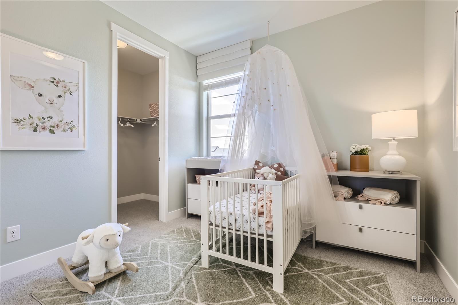 Undisclosed Address Denver, CO 80238 - Photo 18 of 21 a bedroom with furniture and a window
