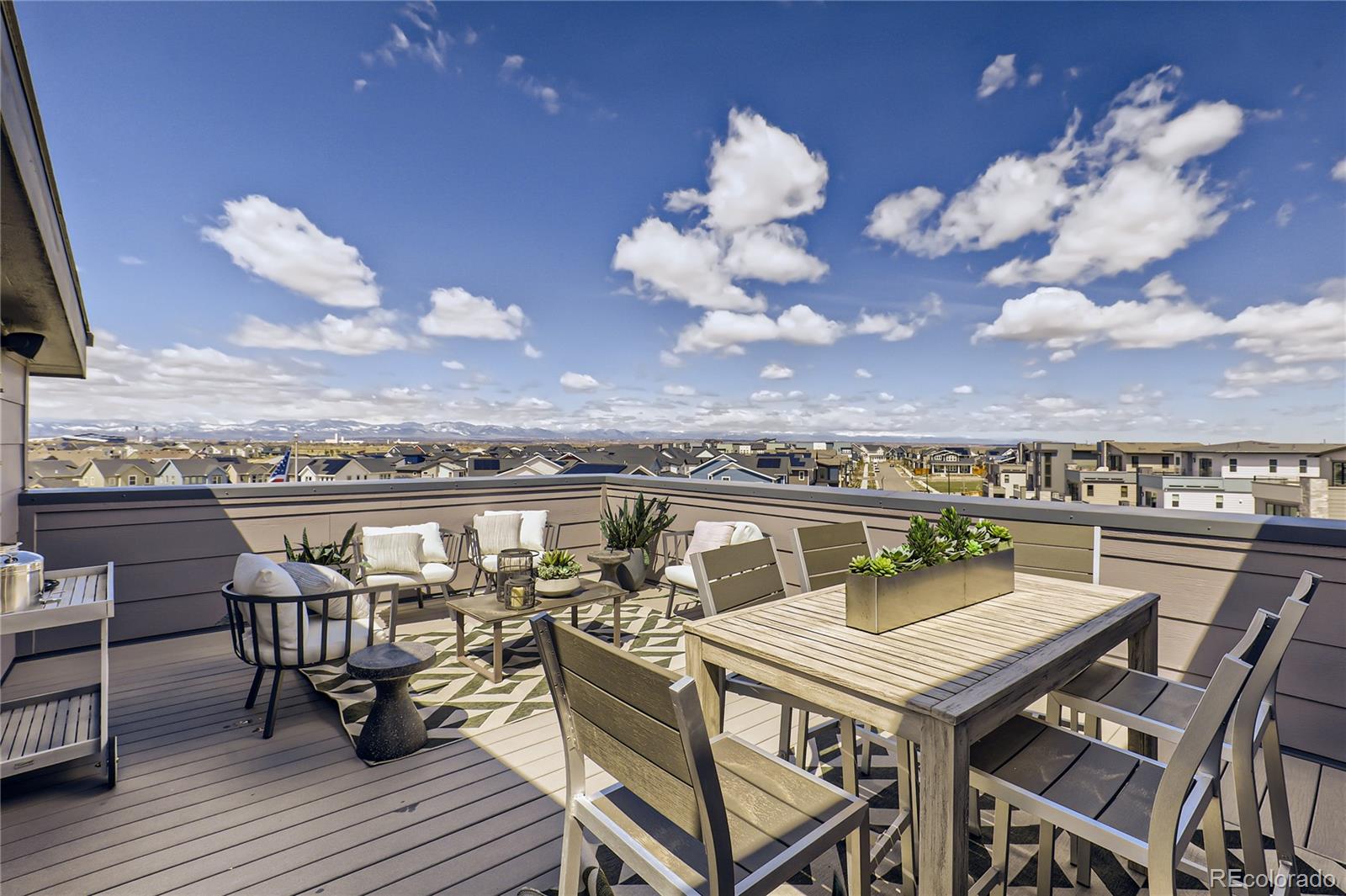 Undisclosed Address Denver, CO 80238 - Photo 2 of 21 a view of a terrace with furniture and wooden floor