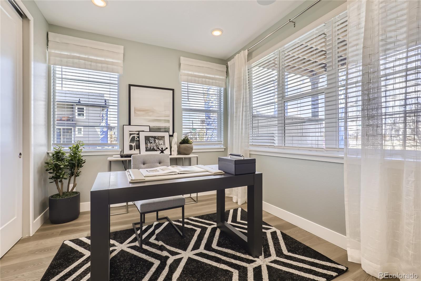 Undisclosed Address Denver, CO 80238 - Photo 4 of 21 a view of a dining room with furniture and window