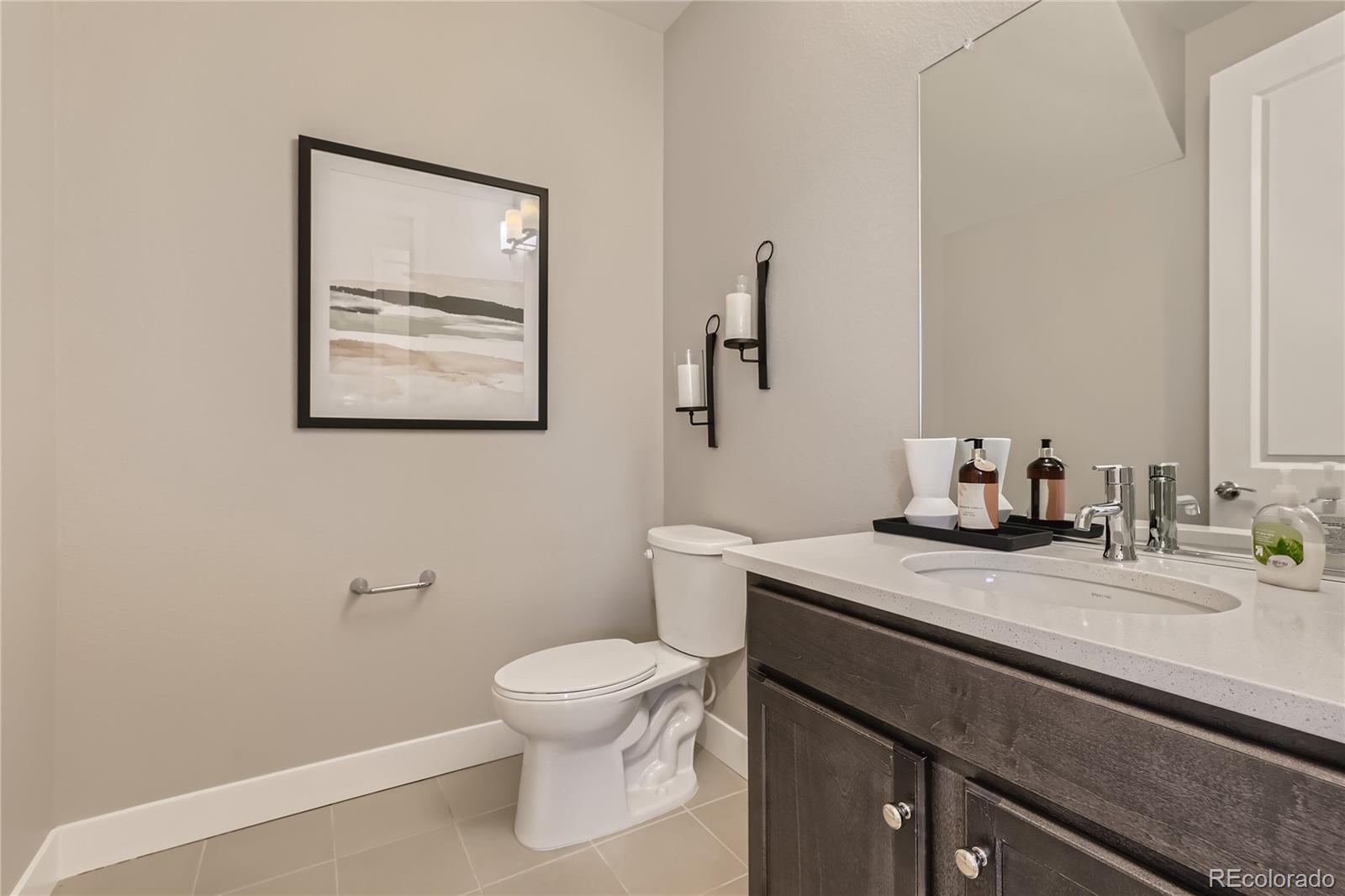 Undisclosed Address Denver, CO 80238 - Photo 5 of 21 a bathroom with a sink and a toilet