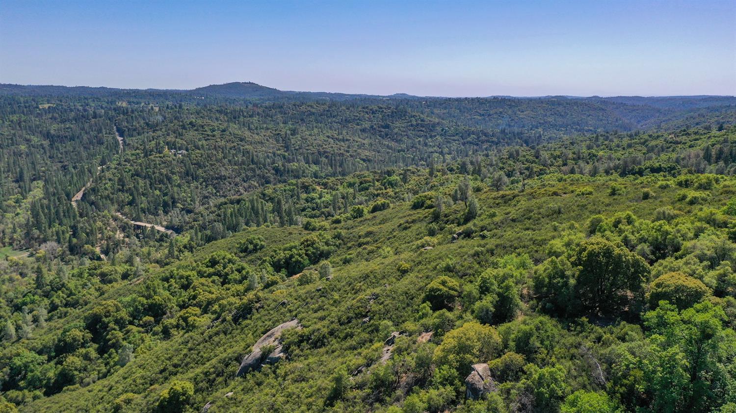 6412 Mt Aukum Road Somerset, CA 95684 - Photo 49 of 65 a view of a lush green hillside and a mountain