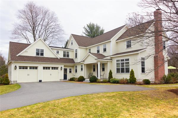 46 Coburn Hill Road Concord, MA 01742 - Photo 1 of 27 a front view of a building with a swimming pool
