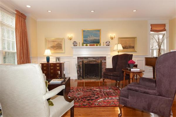 46 Coburn Hill Road Concord, MA 01742 - Photo 11 of 27 a living room with furniture and a fireplace