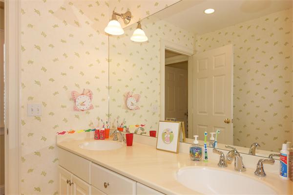 46 Coburn Hill Road Concord, MA 01742 - Photo 19 of 27 a bathroom with a sink and a mirror