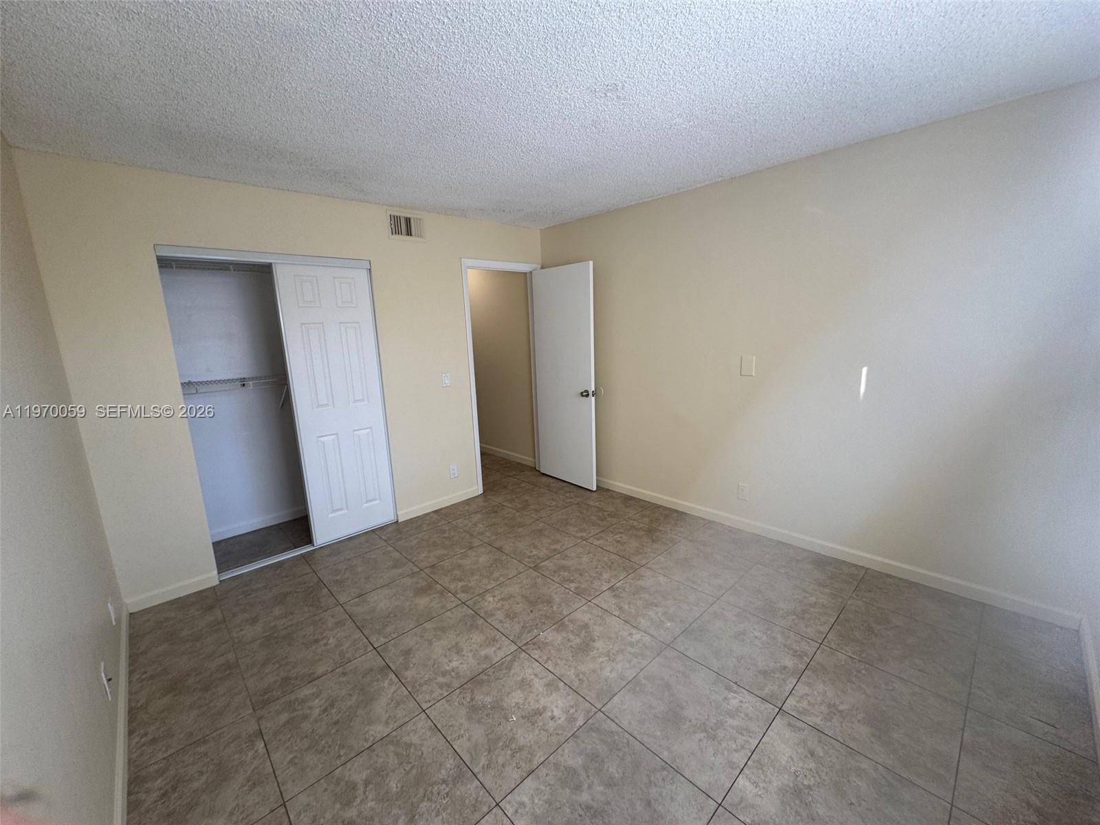 9001 Wiles Road, Unit 204 Coral Springs, FL 33067 - Photo 13 of 16 a view of an empty room