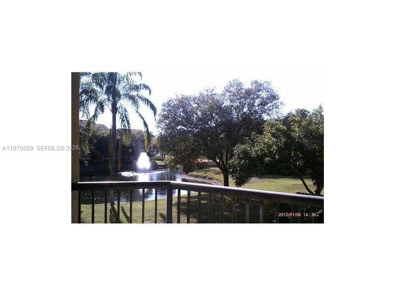 9001 Wiles Road, Unit 204 Coral Springs, FL 33067 - Photo 3 of 16 a view of a balcony