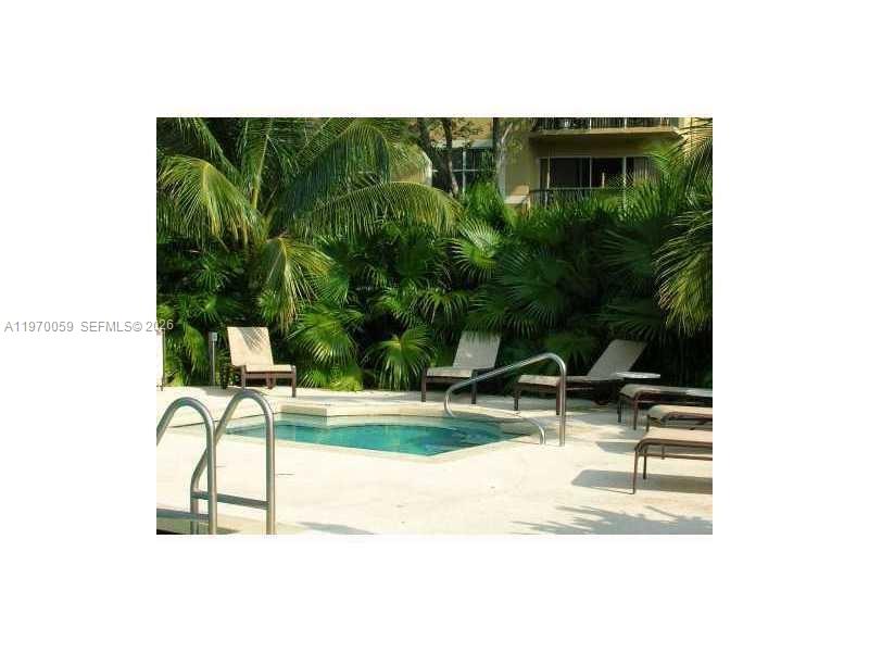 9001 Wiles Road, Unit 204 Coral Springs, FL 33067 - Photo 4 of 16 a picture of a bench in the glass window