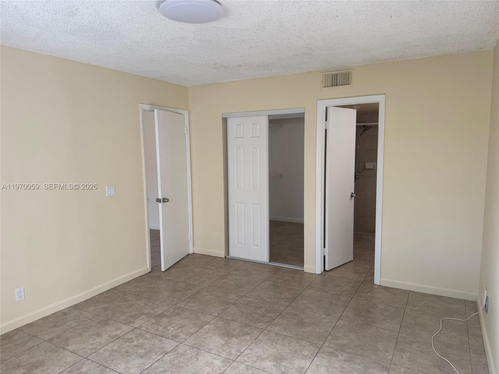 9001 Wiles Road, Unit 204 Coral Springs, FL 33067 - Photo 10 of 16 a view of an empty room