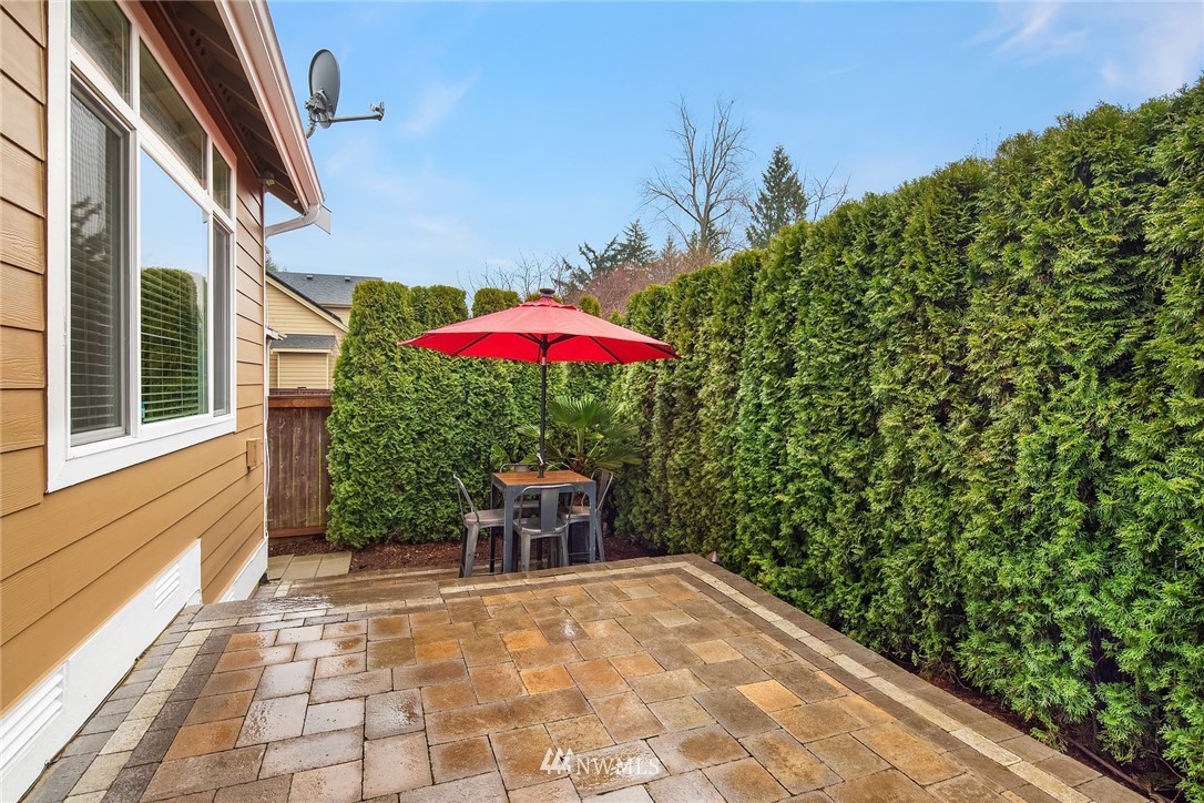 6753 Southeast 2nd Street Renton, WA 98059 - Photo 22 of 32 a view of a backyard with a patio
