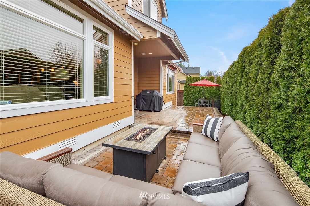 6753 Southeast 2nd Street Renton, WA 98059 - Photo 23 of 32 a view of a patio with couches table and chairs and potted plants