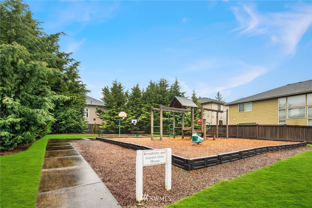 6753 Southeast 2nd Street Renton, WA 98059 - Photo 28 of 32 a view of a swimming pool with a patio