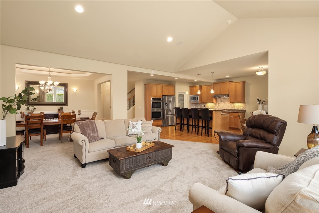 6753 Southeast 2nd Street Renton, WA 98059 - Photo 5 of 32 a living room with furniture and a table