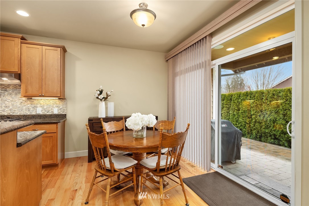 6753 Southeast 2nd Street Renton, WA 98059 - Photo 9 of 32 a dining room with furniture and window