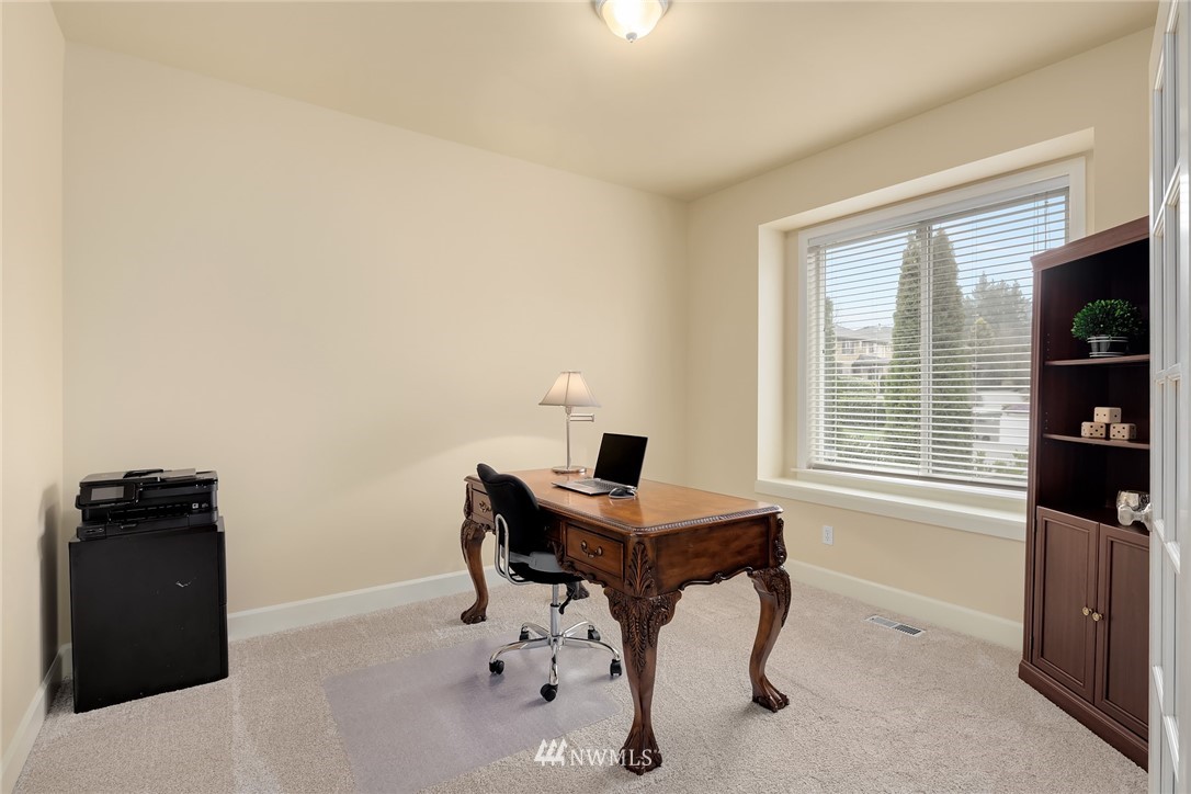 6753 Southeast 2nd Street Renton, WA 98059 - Photo 10 of 32 a room with furniture and a window