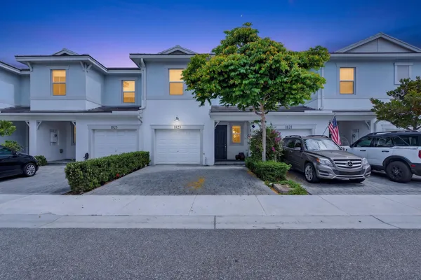 a car parked in front of a house
