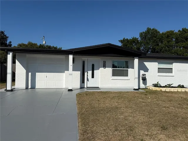 a house with trees in the background
