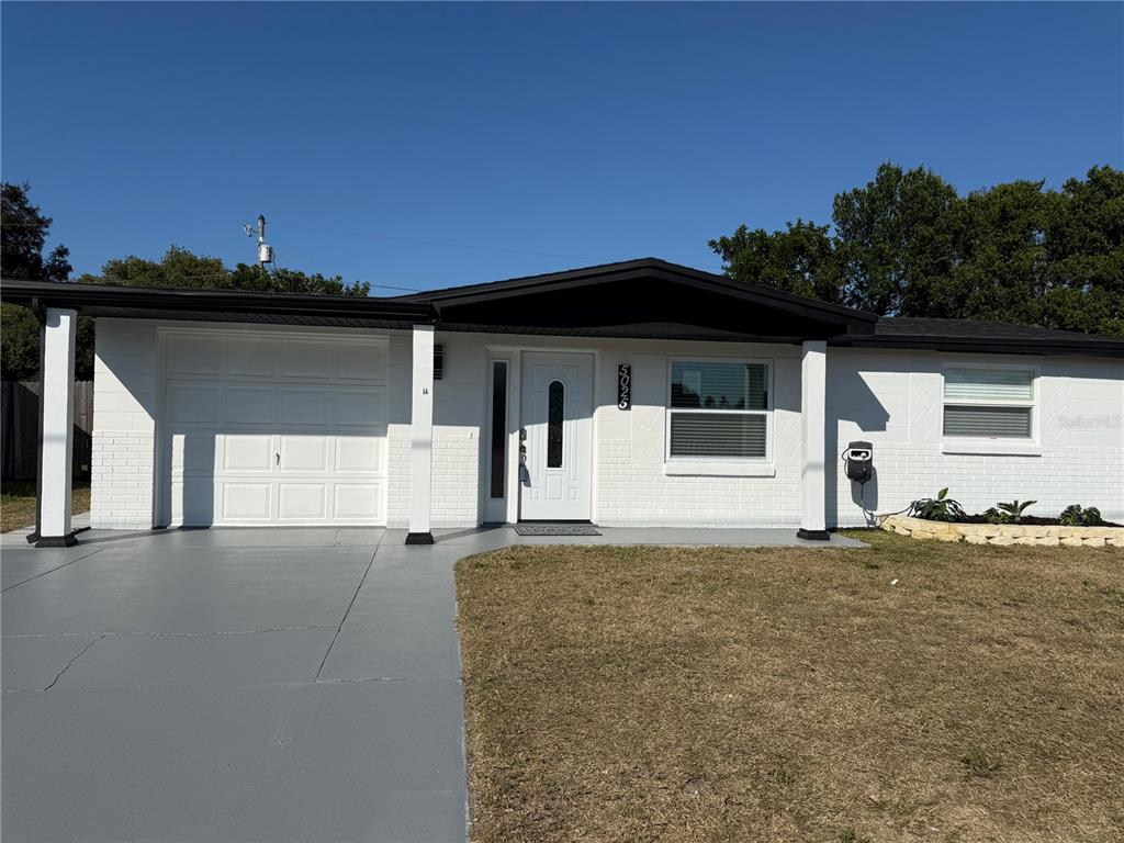 a house with trees in the background