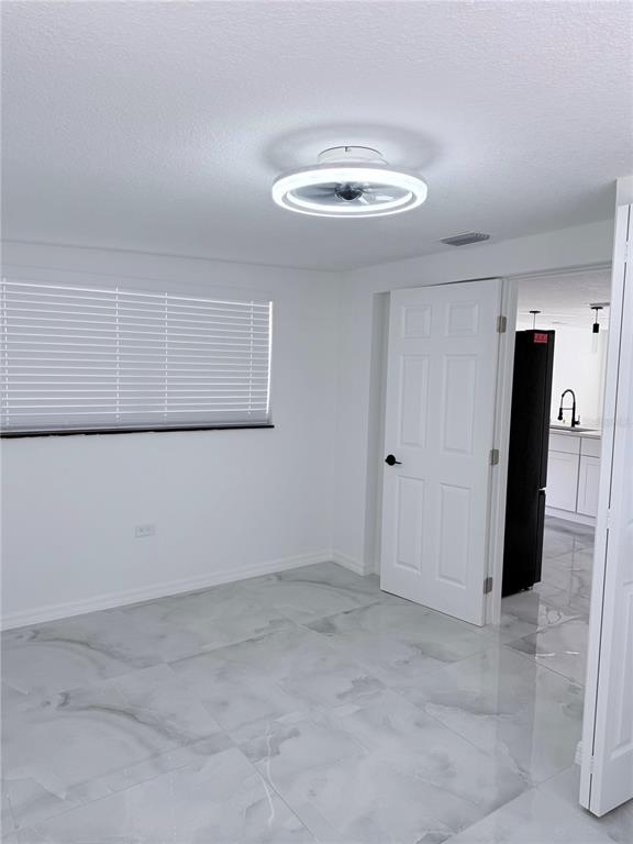 5025 Highway 54 New Port Richey, FL 34652 - Photo 27 of 39 a view of an empty room