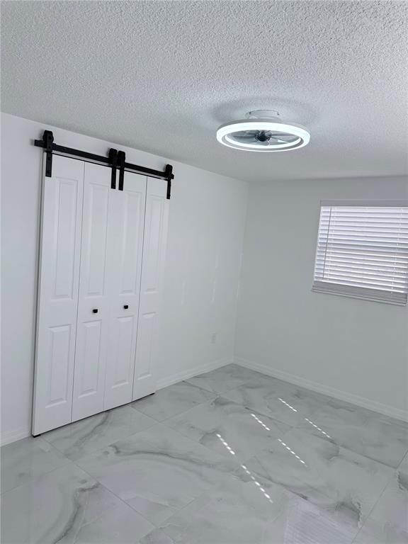 5025 Highway 54 New Port Richey, FL 34652 - Photo 30 of 39 a bathroom with a shower