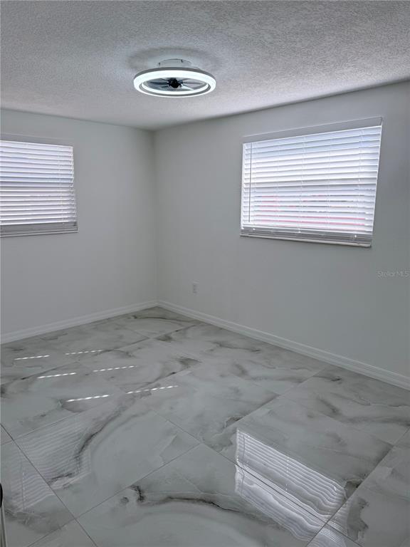 5025 Highway 54 New Port Richey, FL 34652 - Photo 31 of 39 a view of a room with a window