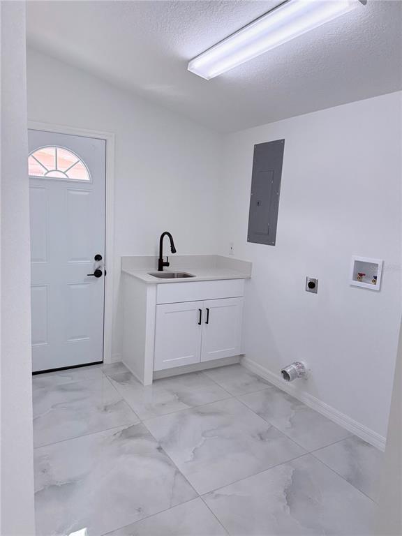 5025 Highway 54 New Port Richey, FL 34652 - Photo 32 of 39 a bathroom with a sink and a mirror