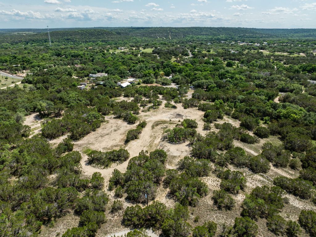 24906 Fawn Drive Leander, TX 78641 - Photo 2 of 39 an aerial view of residential houses with outdoor space and trees