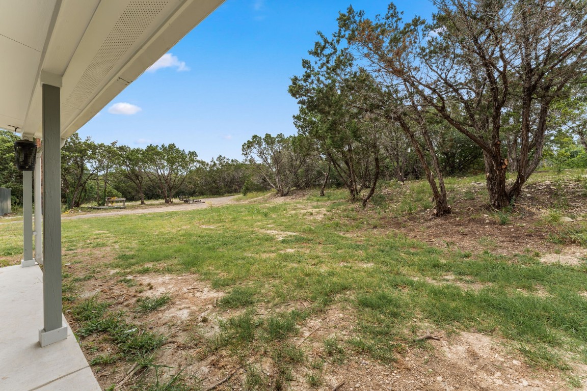 24906 Fawn Drive Leander, TX 78641 - Photo 26 of 39 a view of outdoor space with deck and yard