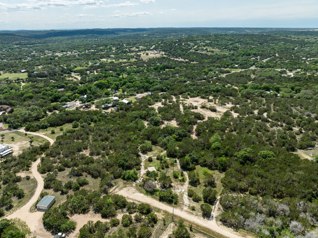 24906 Fawn Drive Leander, TX 78641 - Photo 3 of 39 an aerial view of residential houses with city view