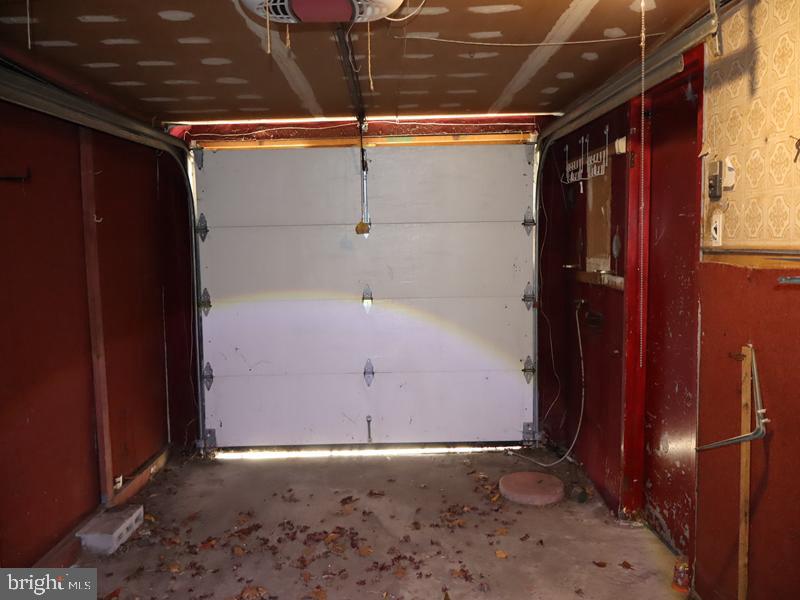 7028 Sheldrake Place Philadelphia, PA 19153 - Photo 3 of 11 a view of a room with racks on the wall