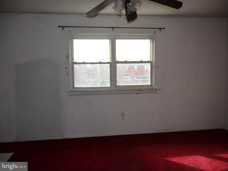 7028 Sheldrake Place Philadelphia, PA 19153 - Photo 7 of 11 an empty room with a window