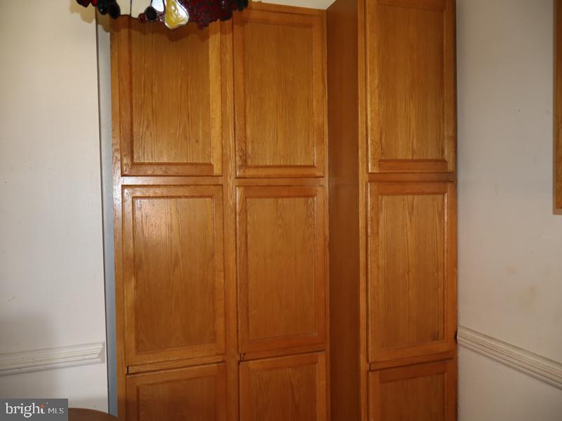 7028 Sheldrake Place Philadelphia, PA 19153 - Photo 8 of 11 a view of walk in closet