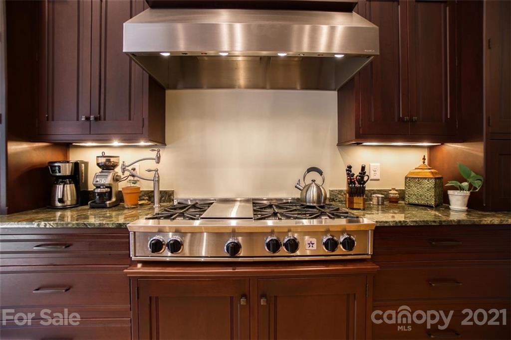 9658 Van Wyck Road Lancaster, SC 29720 - Photo 15 of 44 a stove top oven sitting inside of a kitchen