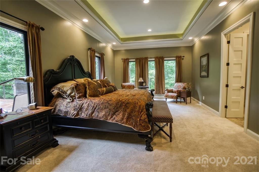 9658 Van Wyck Road Lancaster, SC 29720 - Photo 17 of 44 a bedroom with a bed and a large window