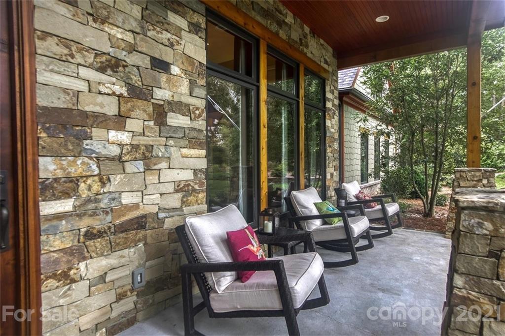 9658 Van Wyck Road Lancaster, SC 29720 - Photo 3 of 44 a living room with patio furniture and a floor to ceiling window