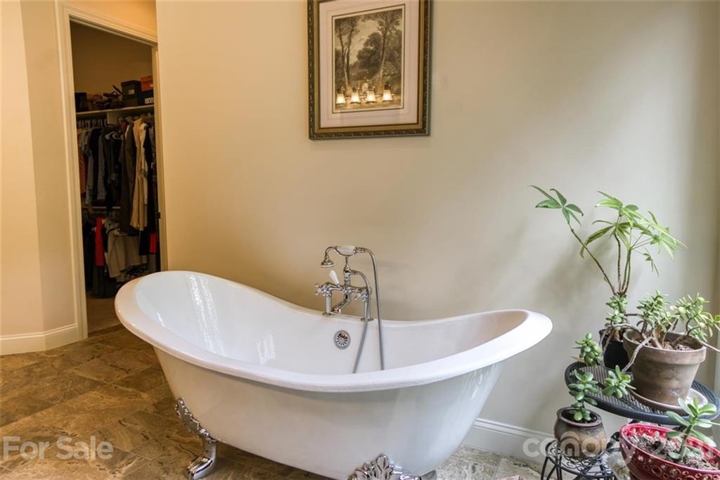 9658 Van Wyck Road Lancaster, SC 29720 - Photo 21 of 44 a bath tub sitting next to a white sink