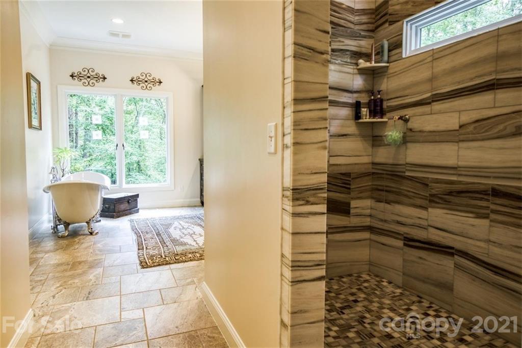 9658 Van Wyck Road Lancaster, SC 29720 - Photo 22 of 44 a bathroom with a sink and a shower