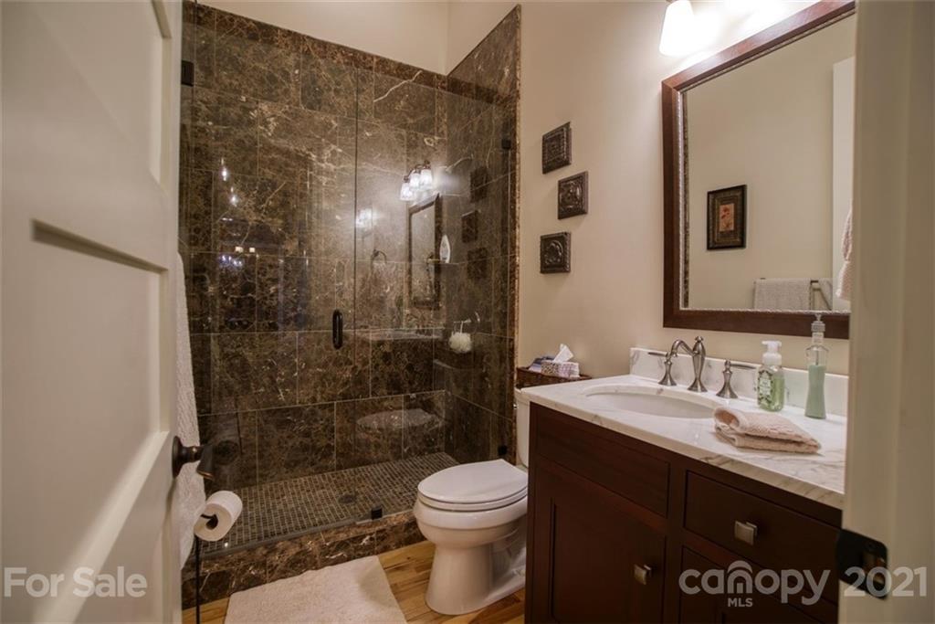 9658 Van Wyck Road Lancaster, SC 29720 - Photo 26 of 44 a bathroom with a sink a toilet and shower