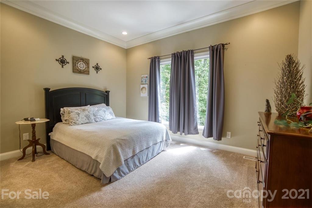 9658 Van Wyck Road Lancaster, SC 29720 - Photo 27 of 44 a bedroom with a bed and a window