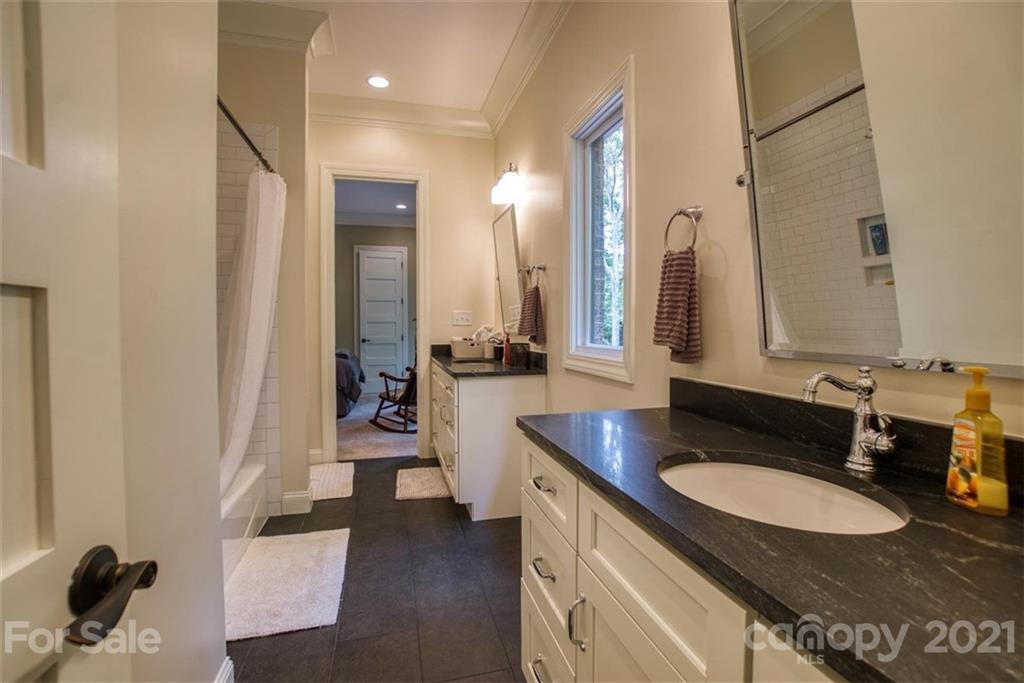 9658 Van Wyck Road Lancaster, SC 29720 - Photo 28 of 44 a bathroom with a sink double vanity and a mirror